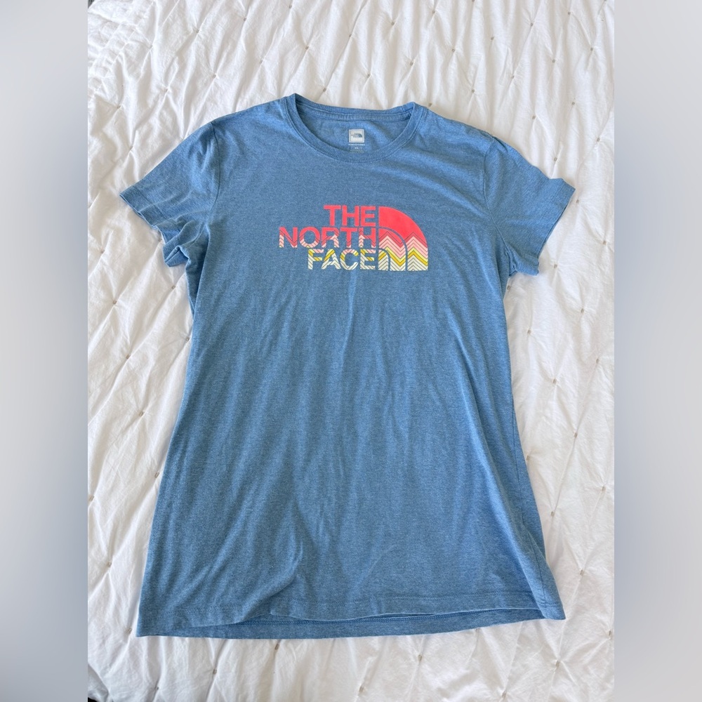 The NorthFace Blue Women’s Tee w Rainbow Logo - M
